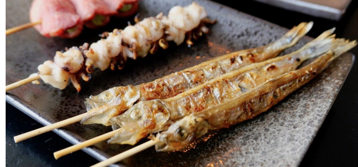 Grilled-Shishamo-and-Squid-Tantacles.gif